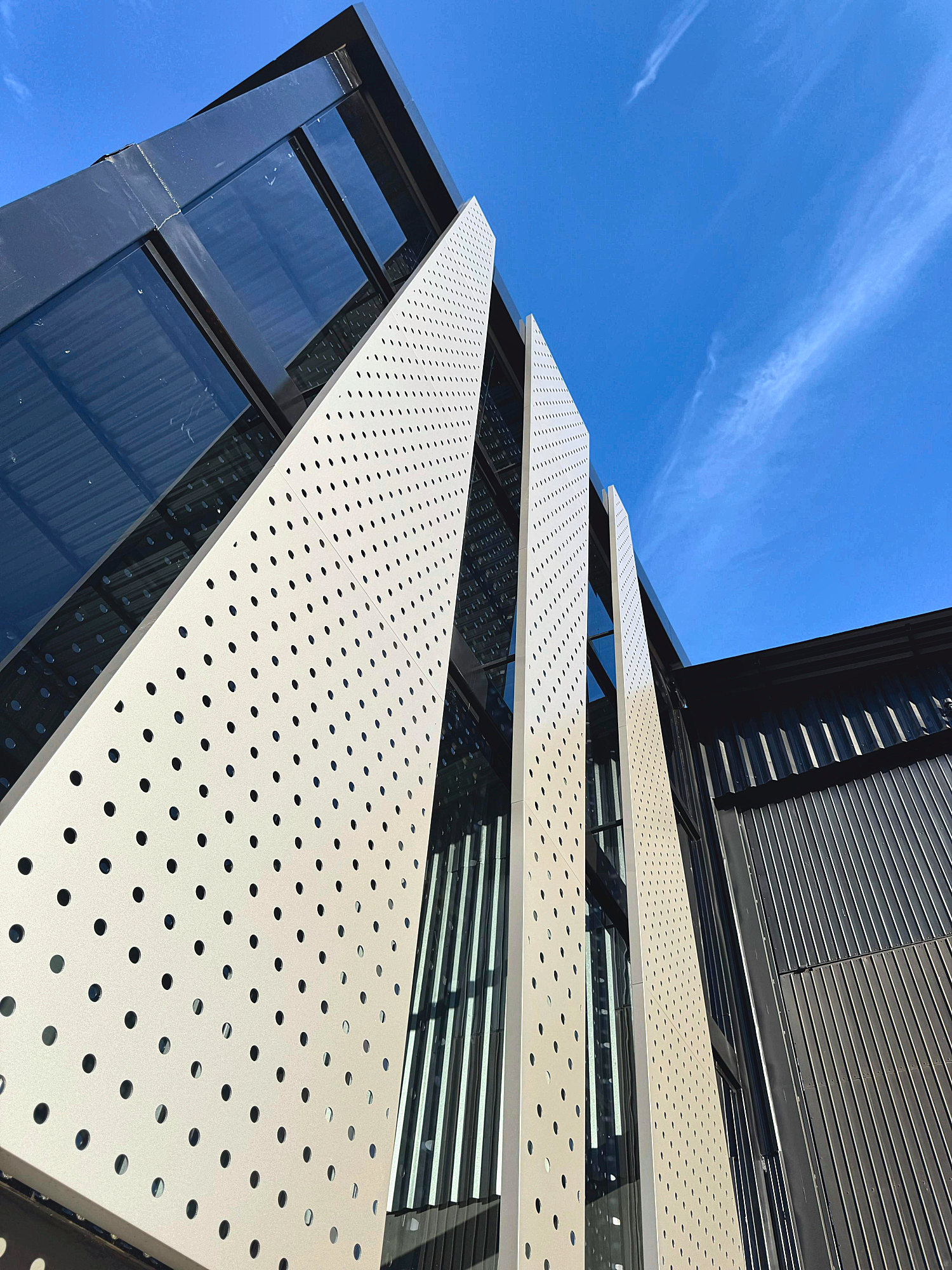 Perforated ACM sheets on a corner